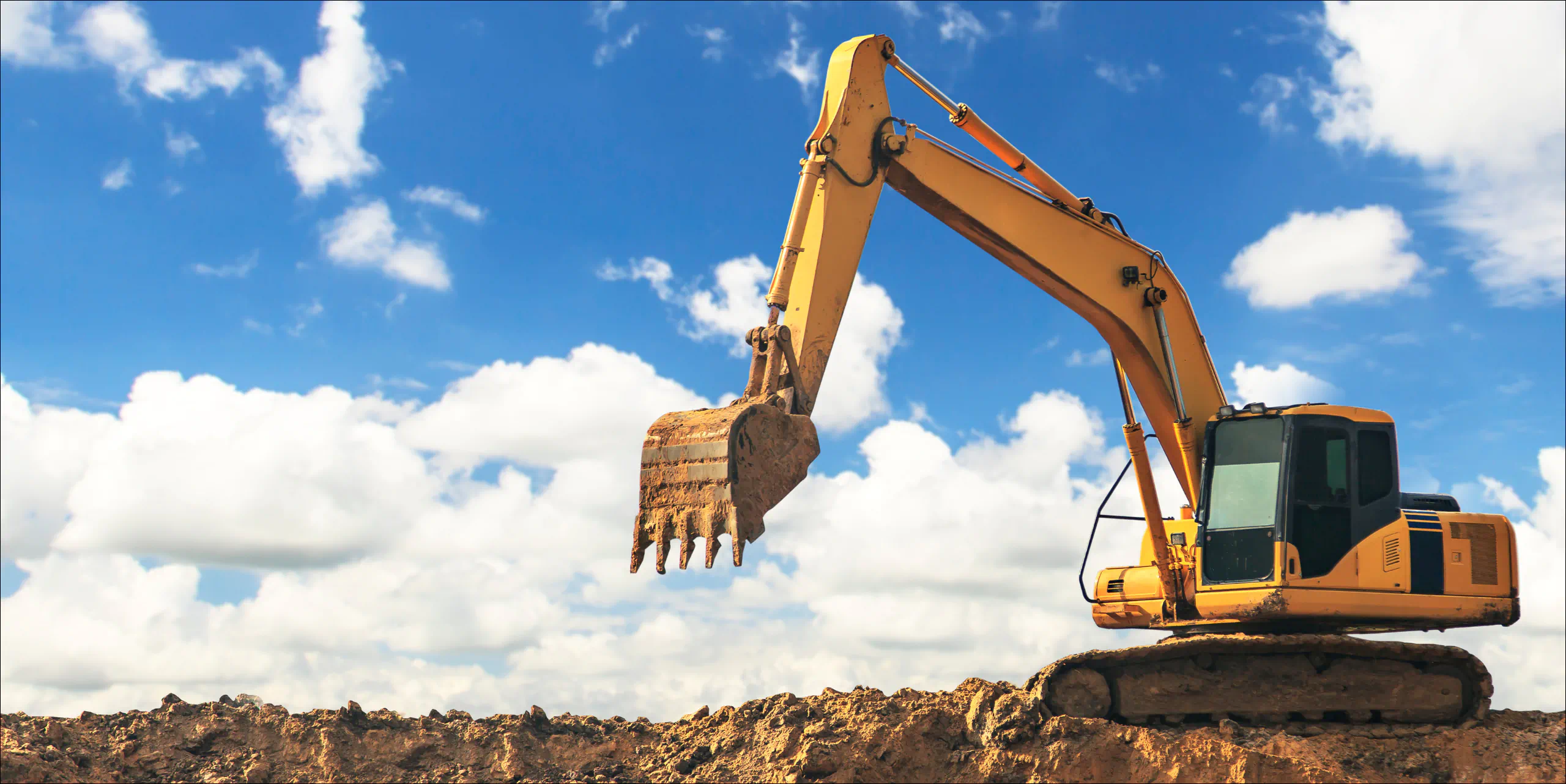 yellow excavation machine being used